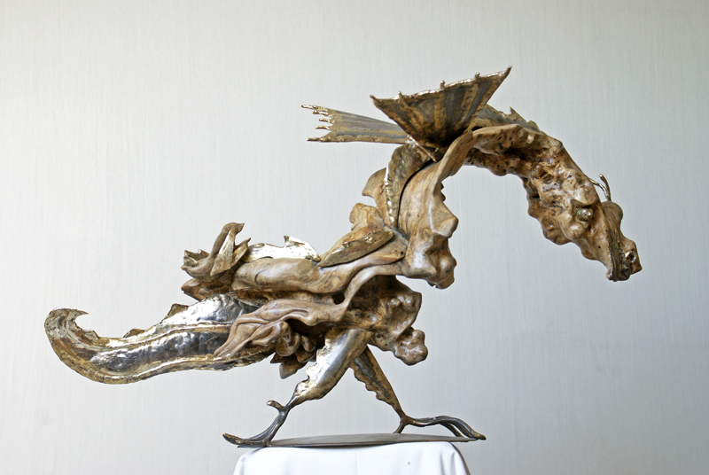 La Tarasque (recto)
réalisée avec Ph. Fautrez, sculpteur métal
tronc d'olivier et acier
dimensions : 80 cm x 50 cm
tarif sur demande